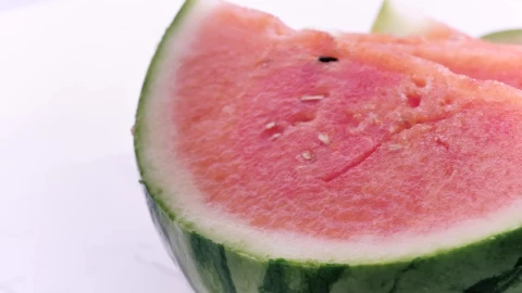 Free Stock Video Rich Watermelon Cut Into Slices On A White Background Live Wallpaper - Free Live Wallpaper