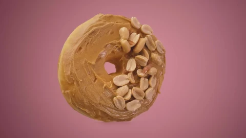 Free Stock Video Rotating Peanut Butter Donut On A Pink Background Live Wallpaper - Free Live Wallpaper