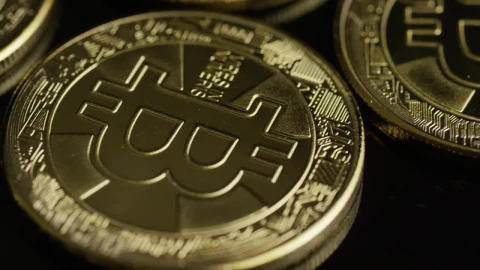 Free Stock Video Rotating Shot Of Bitcoins On A Black Surface Live Wallpaper - Free Live Wallpaper
