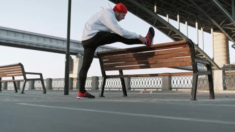 Free Stock Video Runner Stretching His Body Before Start Running Live Wallpaper - Free Live Wallpaper