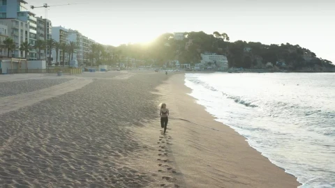 Free Stock Video Running Along A Town Beach Live Wallpaper - Free Live Wallpaper