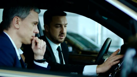 Free Stock Video Salesman Showing New Car To Client Live Wallpaper - Free Live Wallpaper