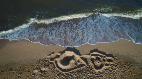 Free Stock Video Sand Castle Next To The Waves Of The Sea Live Wallpaper - Free Live Wallpaper