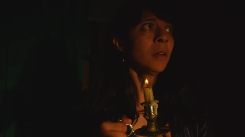 Free Stock Video Scared Woman In A Dark Place With A Candle In Live Wallpaper - Free Live Wallpaper