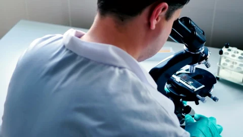 Free Stock Video Scientist Observing Through A Microscope Live Wallpaper - Free Live Wallpaper