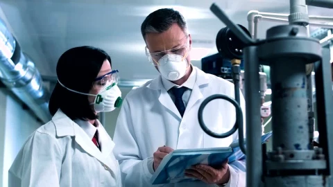 Free Stock Video Scientist Taking Notes From Lab Equipment Live Wallpaper - Free Live Wallpaper