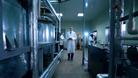 Free Stock Video Scientist Walking Through Laboratory Live Wallpaper - Free Live Wallpaper