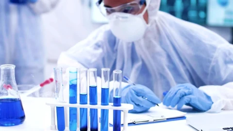 Free Stock Video Scientist With Bubbling Vials Live Wallpaper - Free Live Wallpaper