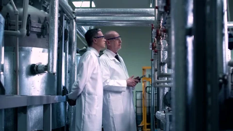 Free Stock Video Scientists Looking At Laboratory Pipes Live Wallpaper - Free Live Wallpaper