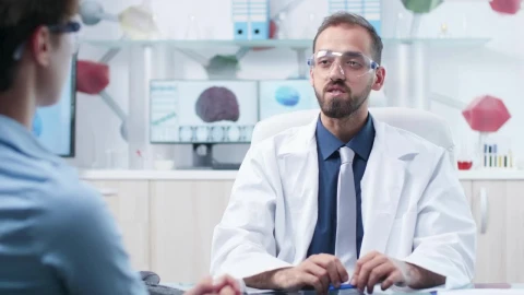 Free Stock Video Scientists Share Innovation Using Ar Tech In Modern Research Lab Live Wallpaper - Free Live Wallpaper