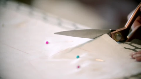 Free Stock Video Seamstress Cutting White Fabric Live Wallpaper - Free Live Wallpaper