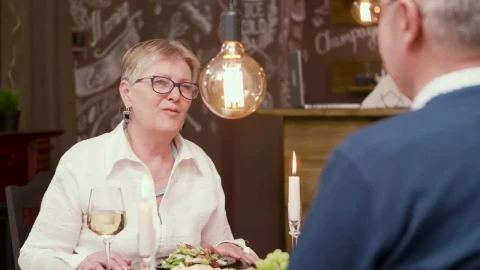 Free Stock Video Senior Woman Chats Over Romantic Dinner In Modern Restaurant Live Wallpaper - Free Live Wallpaper