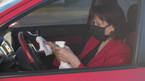 Free Stock Video Senior Woman Disinfecting The Steering Wheel Live Wallpaper - Free Live Wallpaper