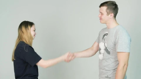 Free Stock Video Shaking Hands Against An Isolated Background Live Wallpaper - Free Live Wallpaper