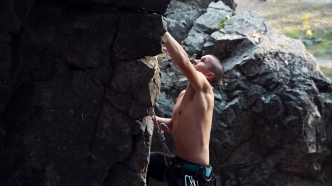 Free Stock Video Shirtless Man Climbing A Rock In The Wild Live Wallpaper - Free Live Wallpaper