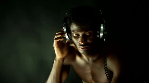 Free Stock Video Shirtless Man Listening To Music With Retro Headphones Live Wallpaper - Free Live Wallpaper