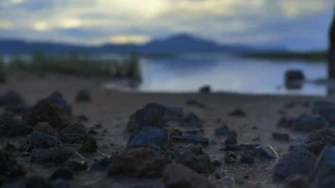 Free Stock Video Shore Of A Calm Lake With Sand Grass And Rocks Live Wallpaper - Free Live Wallpaper