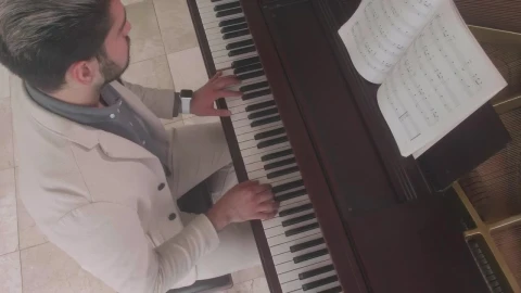 Free Stock Video Shot From Above Of A Musician Playing A Grand Piano Live Wallpaper - Free Live Wallpaper