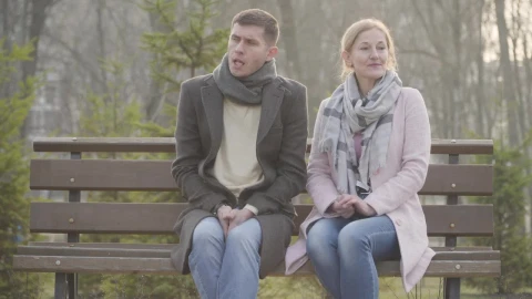 Free Stock Video Shy Couple Sit Silent On Park Bench On Cold Day Live Wallpaper - Free Live Wallpaper