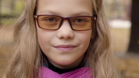 Free Stock Video Shy Little Girl In Glasses Looks Up To Camera Live Wallpaper - Free Live Wallpaper