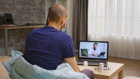 Free Stock Video Sick Man In Online Video Consultation With Doctor Live Wallpaper - Free Live Wallpaper
