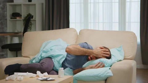 Free Stock Video Sick Man Lays On Sofa During Coronavirus Pandemic Live Wallpaper - Free Live Wallpaper