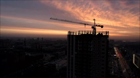 Free Stock Video Silhouette Of A Crane Over A Build Under Construction Live Wallpaper - Free Live Wallpaper
