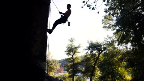 Free Stock Video Silhouette Of A Man Doing An Abseil Live Wallpaper - Free Live Wallpaper