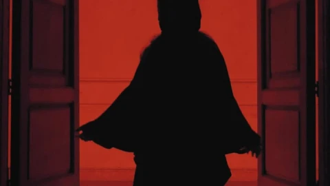 Free Stock Video Silhouette Of A Person With Horns And Robe Under A Live Wallpaper - Free Live Wallpaper