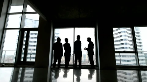Free Stock Video Silhouette Of Business People Talking By Highrise Window Live Wallpaper - Free Live Wallpaper