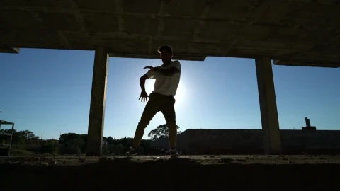 Free Stock Video Silhouette Of Man Dancing In An Abandoned Building Live Wallpaper - Free Live Wallpaper