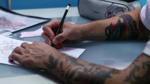 Free Video Stock Sketching A New Tattoo Design Live Wallpaper - Free Live Wallpaper