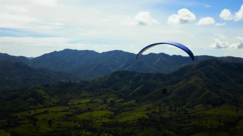 Free Video Stock Skydiver Flying Over A Mountain Range Live Wallpaper - Free Live Wallpaper