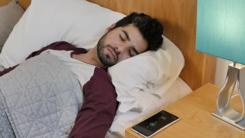 Free Video Stock Sleeping Man Is Awakened By His Cell Phone Alarm Live Wallpaper - Free Live Wallpaper