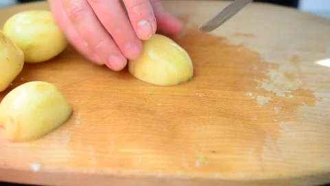 Free Video Stock Slicing Raw Potatoes On A Table Live Wallpaper - Free Live Wallpaper