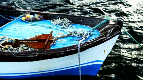 Free Video Stock Small Anchored Fishing Boat Seen In Detail Live Wallpaper - Free Live Wallpaper