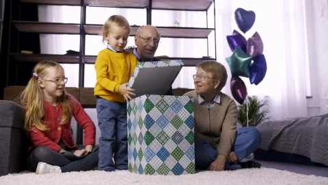 Free Video Stock Small Child Unwrapping A Tank Live Wallpaper - Free Live Wallpaper