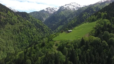 Free Video Stock Small Meadow And A House In The Mountain Live Wallpaper - Free Live Wallpaper