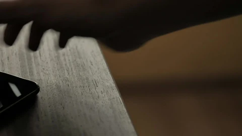 Free Video Stock Smartphone On A Wooden Table Live Wallpaper - Free Live Wallpaper