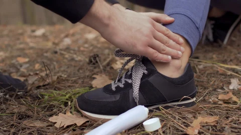 Free Video Stock Smearing Ointment On A Persons Ankle Live Wallpaper - Free Live Wallpaper