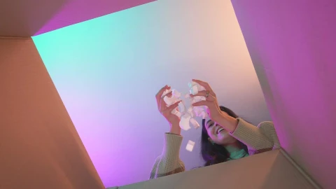 Free Video Stock Smiling Girl Putting Packing Filler In A Box Live Wallpaper - Free Live Wallpaper
