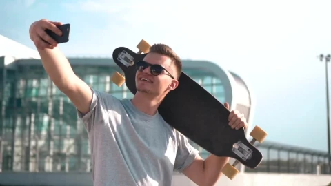 Free Video Stock Smiling Skater Takes Selfie For Social Media Live Wallpaper - Free Live Wallpaper