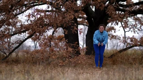 Free Video Stock Smiling Woman Calling Her Dog In The Rain Live Wallpaper - Free Live Wallpaper