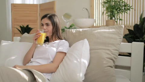 Free Video Stock Smiling Woman Drinking Orange Juice Live Wallpaper - Free Live Wallpaper