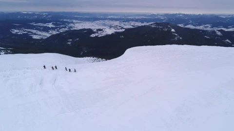 Free Video Stock Snowboarders Walking In The Snow Drone Shot Live Wallpaper - Free Live Wallpaper