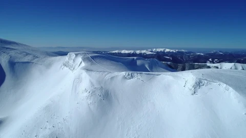 Free Video Stock Snowy Mountain Range Seen On A Clear Sky Day Live Wallpaper - Free Live Wallpaper