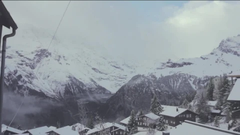 Free Video Stock Snowy Mountains Above A Small Town Live Wallpaper - Free Live Wallpaper