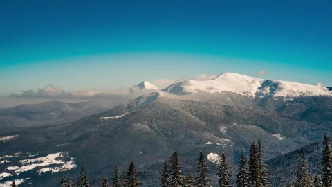 Free Video Stock Snowy Mountains Seen From Afar Live Wallpaper - Free Live Wallpaper