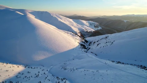 Free Video Stock Snowy Valley Between Mountains Aerial Shot Live Wallpaper - Free Live Wallpaper