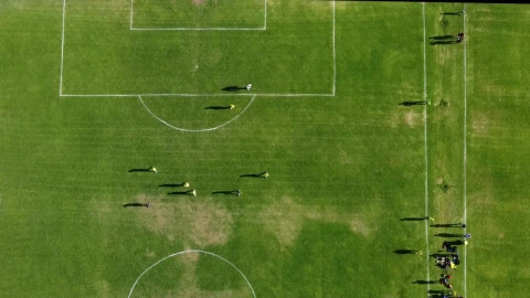 Free Video Stock Soccer Match On A Grass Court From Above Live Wallpaper - Free Live Wallpaper